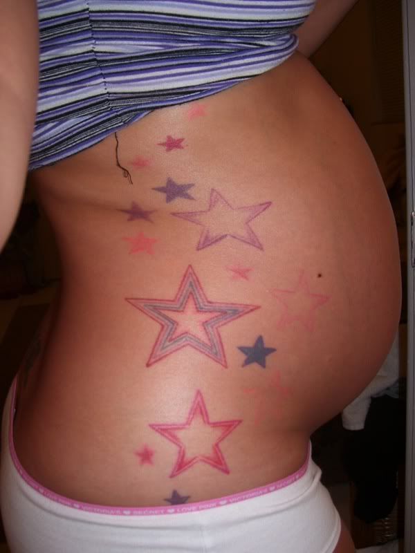 Nice star tattoo on side body