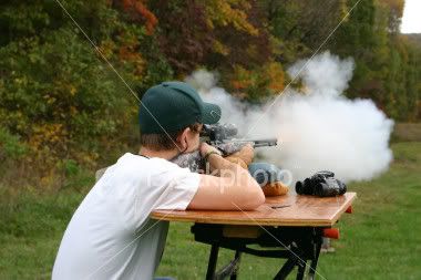 muzzle_loader_rifle_being_fired.jpg